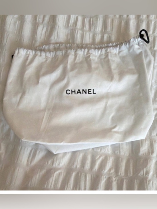 CHANEL Handbags - CHANEL White Drawstring Logo Dust Pouch